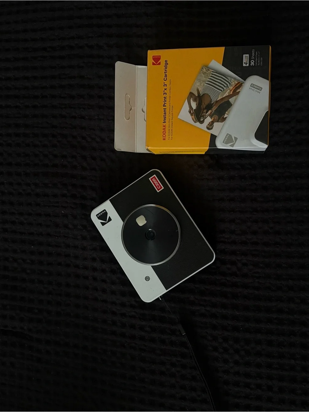 Kodak Instant Camera in Black and White with Yellow Film Box